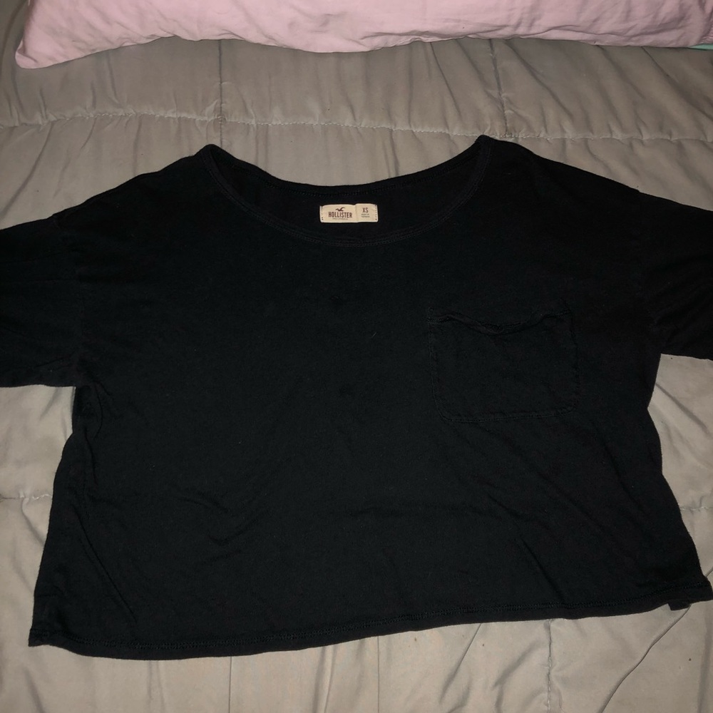 This is an extra small black crop top.